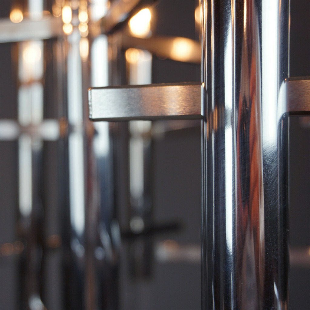 photo of portion of nine-lamp mid-century modern chrome and lucite chandelier designed in 1970s by famous Italian designer Gaetano Sciolari from mindscapade.