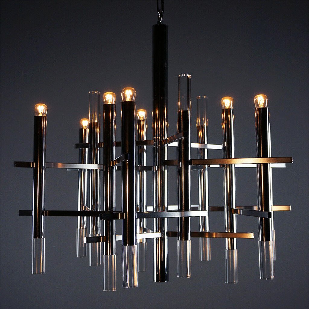 photo of nine-lamp 1970s-era chrome and lucite chandelier with lights dimmed down for candleight-like effect, designed by famous Italian designer, Gaetano Sciolari from mindscapade.