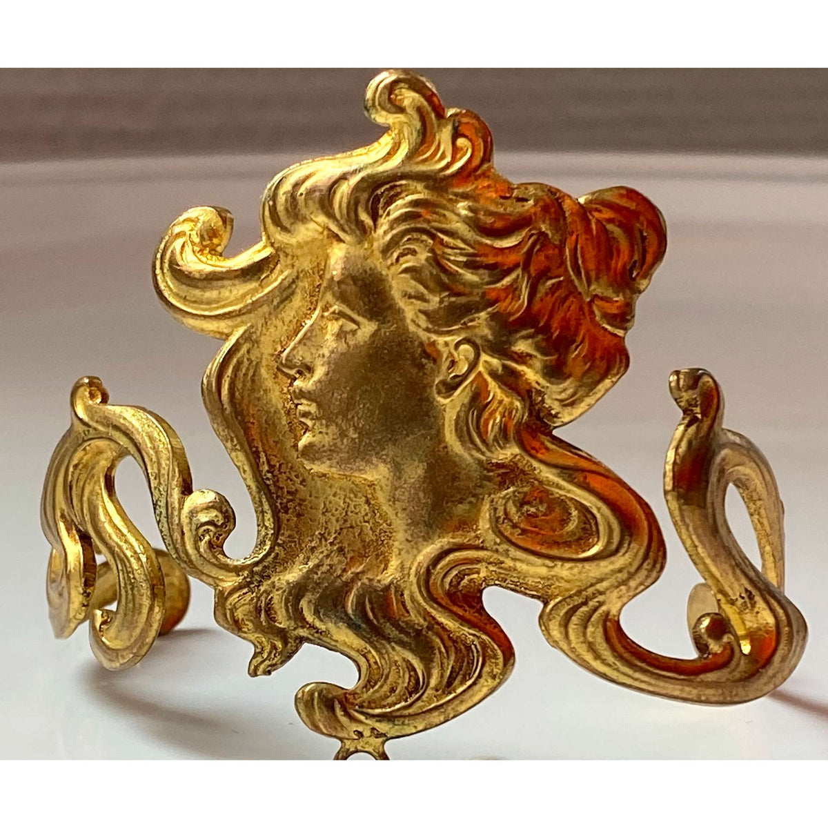 gold ornate woman&#39;s cameo bracelet with attached ring