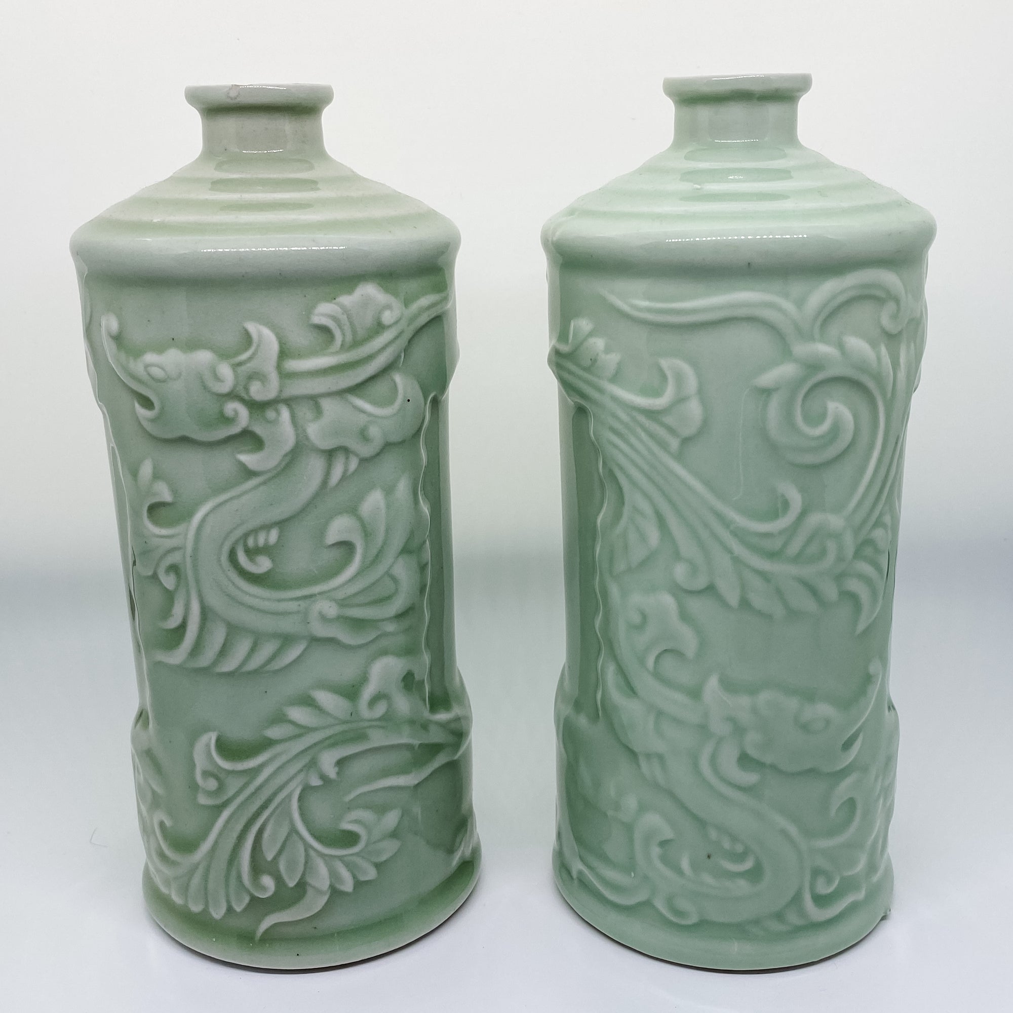Handmade pair of Asian celadon ceramic bud vases