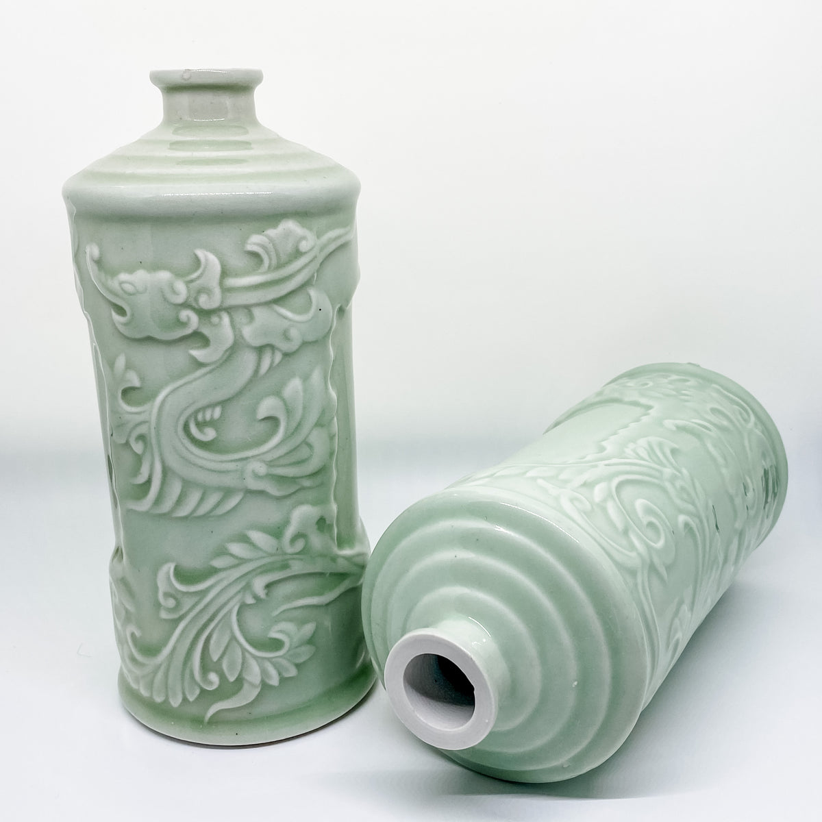Handmade pair of Asian celadon ceramic bud vases