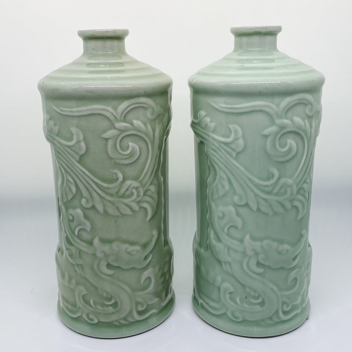 Handmade pair of Asian celadon ceramic bud vases