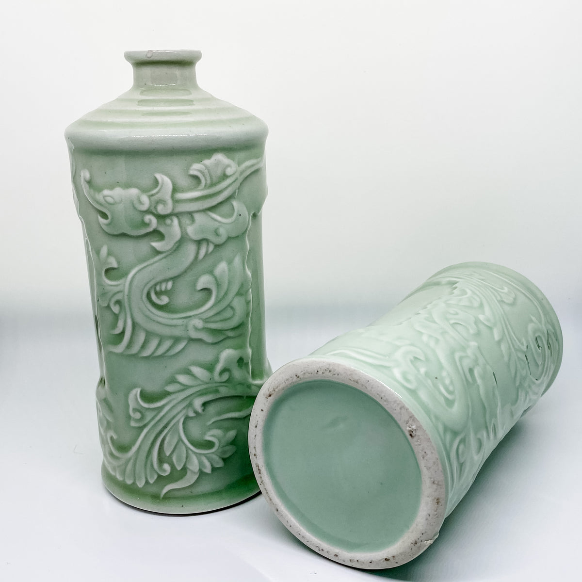 Handmade pair of Asian celadon ceramic bud vases