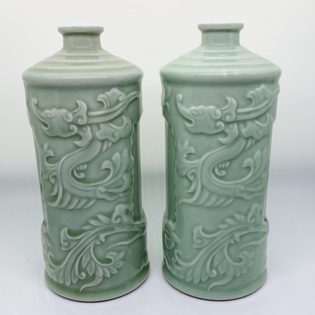 Handmade pair of Asian celadon ceramic bud vases