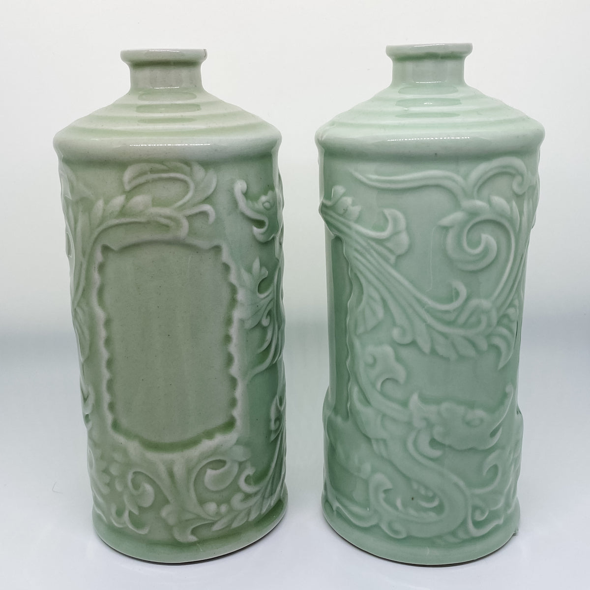 Handmade pair of Asian celadon ceramic bud vases
