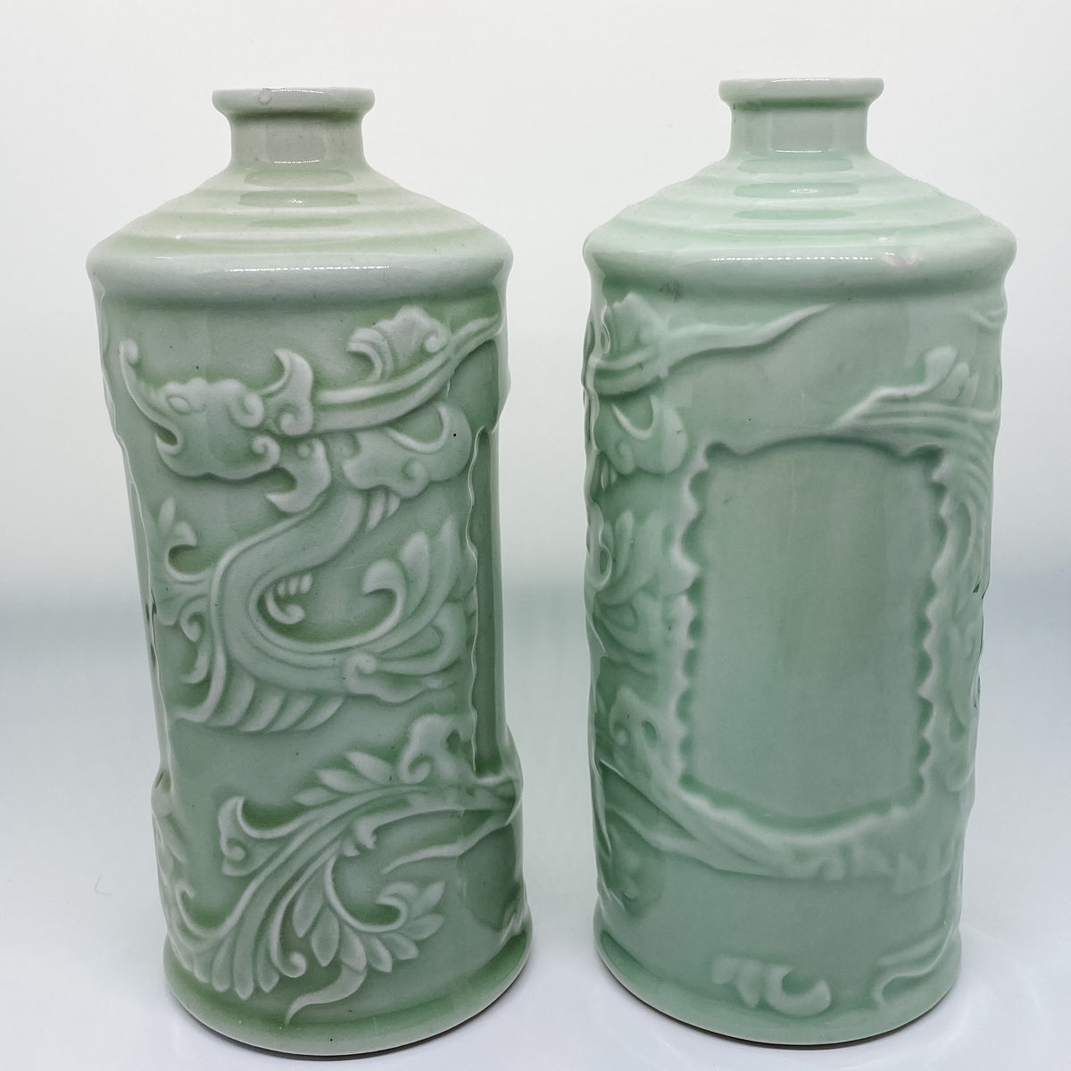 Handmade pair of Asian celadon ceramic bud vases